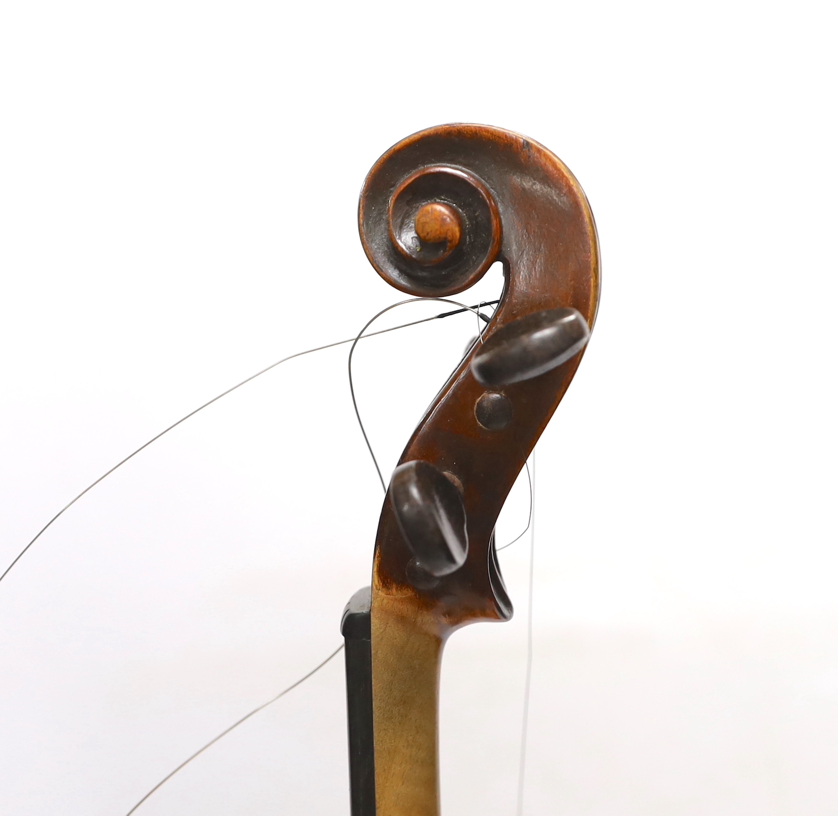 A violin labelled 'Albani Palermo', cased, length of back 35.5cm